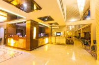 TV a/nebo společenská místnost v ubytování REAL KiNG SUiTE HOTEL