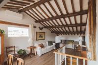 A seating area at Amazing penthouse with terrace and rooftop in Trastevere