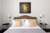 A bed or beds in a room at SuityRHome Campo de' Fiori