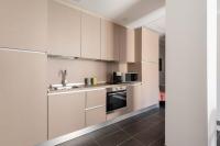 A kitchen or kitchenette at SuityRHome Campo de' Fiori