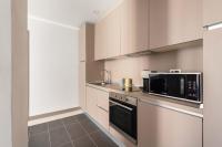 A kitchen or kitchenette at SuityRHome Campo de' Fiori