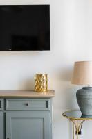 A television and/or entertainment centre at SuityRHome Campo de' Fiori