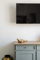 A television and/or entertainment centre at SuityRHome Campo de' Fiori