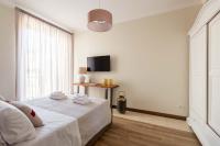A bed or beds in a room at SuityRHome Campo de' Fiori