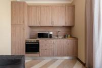 A kitchen or kitchenette at SuityRHome Campo de' Fiori