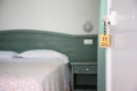 Postel nebo postele na pokoji v ubytování Albergo Villa Mario