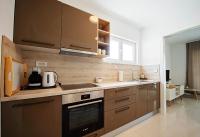Kuchyňa alebo kuchynka v ubytovaní Sea Front Apartments Ivana