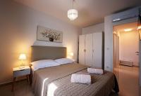 Posteľ alebo postele v izbe v ubytovaní Sea Front Apartments Ivana