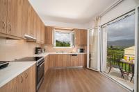 Kuchyň nebo kuchyňský kout v ubytování Ilias Apartments