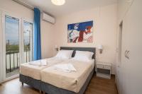 Postel nebo postele na pokoji v ubytování Ilias Apartments