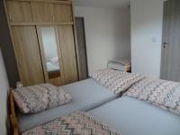 Postel nebo postele na pokoji v ubytování Apartmán Karovi