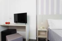 A television and/or entertainment centre at Hotel Star