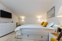 Posteľ alebo postele v izbe v ubytovaní Kuki apartment with balcony