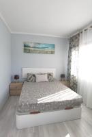 A bed or beds in a room at Apartamento Club Paraíso con vista Teide y Mar