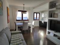 Kuchyň nebo kuchyňský kout v ubytování ATALAYA SUNSET terrazza panoramica privata con vista al mare