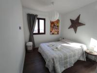 Postel nebo postele na pokoji v ubytování ATALAYA SUNSET terrazza panoramica privata con vista al mare