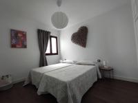 Postel nebo postele na pokoji v ubytování ATALAYA SUNSET terrazza panoramica privata con vista al mare