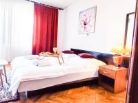 Posteľ alebo postele v izbe v ubytovaní Apartmani Ankica