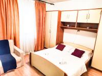Posteľ alebo postele v izbe v ubytovaní Apartmani Ankica