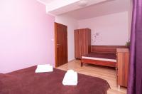 Posteľ alebo postele v izbe v ubytovaní Apartmany Sileas