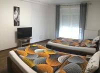 Posteľ alebo postele v izbe v ubytovaní Nina Apartment