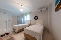 Postel nebo postele na pokoji v ubytování Bahar Villas Sapanca