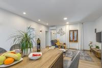 TV a/nebo společenská místnost v ubytování Apartment Nilda II