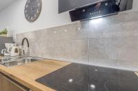 Kuchyň nebo kuchyňský kout v ubytování Apartment Nilda II