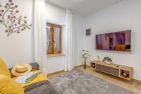 TV a/nebo společenská místnost v ubytování Apartment Nilda II
