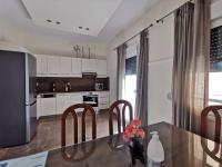 Kuchyň nebo kuchyňský kout v ubytování NAFPAKTOS Beach luxury Suites