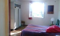 a bedroom with a bed and a window at Appartement d&#39;une chambre avec vue sur la mer jardin amenage et wifi a Hyeres a 2 km de la plage in Hyères