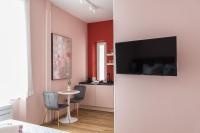 Televízia a/alebo spoločenská miestnosť v ubytovaní Center De Lux Studios “ Zara “
