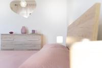 Posteľ alebo postele v izbe v ubytovaní Ludo Home
