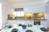 Kuchnia lub aneks kuchenny w obiekcie Paola House