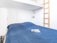 Llit o llits en una habitaci&oacute; de Apartment Les H&eacute;lianthes-1 by Interhome