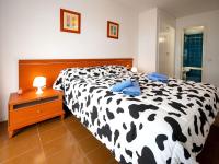 Postel nebo postele na pokoji v ubytování Apartment Osuna by Interhome