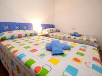 Postel nebo postele na pokoji v ubytování Apartment Osuna by Interhome