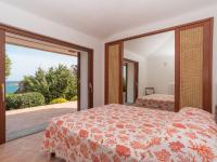 A bed or beds in a room at Villa Malvasia by Interhome