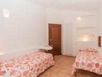 A bed or beds in a room at Villa Malvasia by Interhome