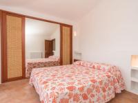 A bed or beds in a room at Villa Malvasia by Interhome