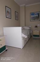 A bed or beds in a room at Anamari's