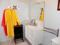 a bathroom with a sink and a mirror at Appartement de 3 chambres a Les Sables d&#39;Olonne a 800 m de la plage avec wifi in Les Sables-d&#39;Olonne