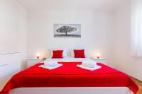 Posteľ alebo postele v izbe v ubytovaní Oleander Apartment