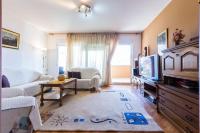 Televízia a/alebo spoločenská miestnosť v ubytovaní Oleander Apartment