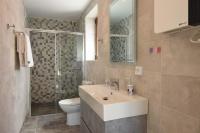 A bathroom at Villa Dafni - Infinite Sea Vistas with Private Pool
