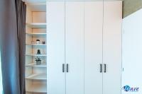 a closet with white cabinets and a window at MODERN apartments WAVE near the AIRPORT in Velika Gorica