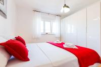 Posteľ alebo postele v izbe v ubytovaní Oleander Apartment