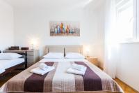 Posteľ alebo postele v izbe v ubytovaní Oleander Apartment