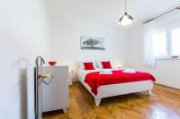 Posteľ alebo postele v izbe v ubytovaní Oleander Apartment
