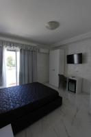 Posteľ alebo postele v izbe v ubytovaní Hotel Presidente